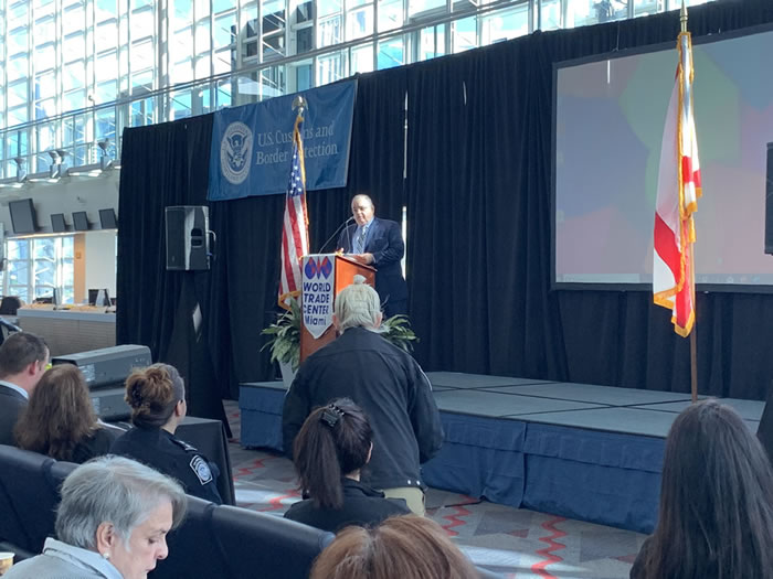 Roberto Munoz at Podium of a Miami World Trade Month Event